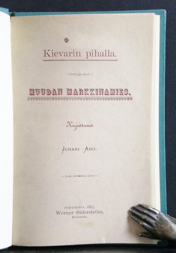 Juhani Aho Kievarin pihalla. Muudan markkinamies (1884)